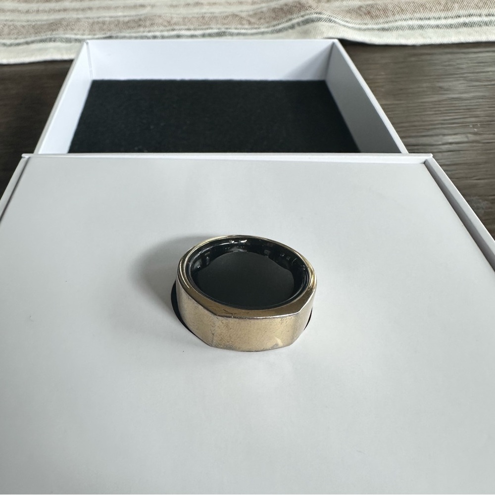 Oura Elegant Black and Gold Ring